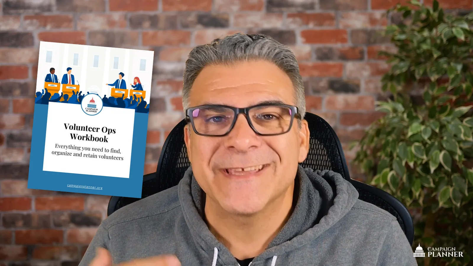 Craig Grella teaching Volunteer Ops, with the Volunteer Ops Workbook